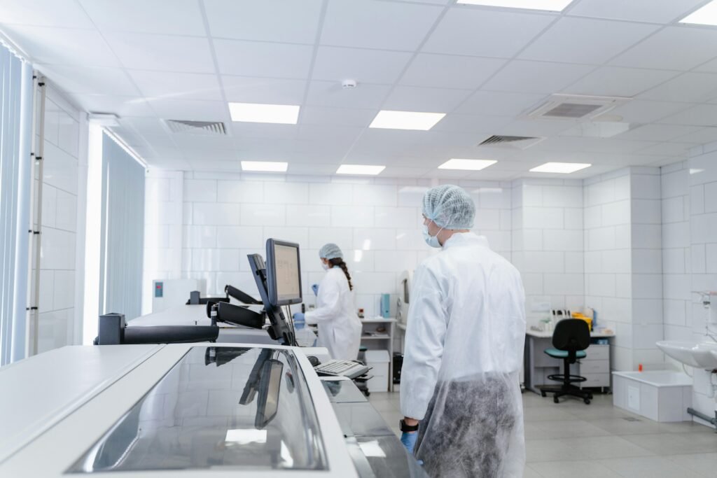 Laboratory professionals conducting research in a modern, well-equipped lab environment.